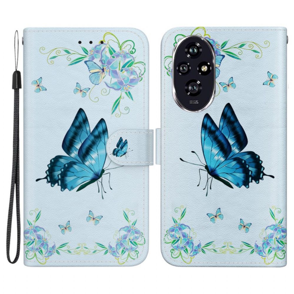 Folio-hoesje Honor 200 Telefoonhoesje Blauwe Vlinder En Bloemen Met Riempje