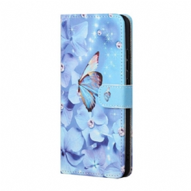 Folio-hoesje Google Pixel 8a Telefoonhoesje Blauwe Bloemen En Vlinders Met Riempje