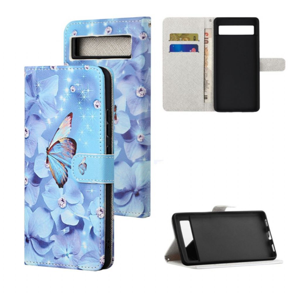 Folio-hoesje Google Pixel 8a Telefoonhoesje Blauwe Bloemen En Vlinders Met Riempje