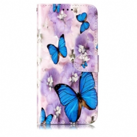 Leren Hoesje Samsung Galaxy S24 Plus 5g Blauwe Vlinders En Paarse Bloemen Met Riempje Bescherming Hoesje