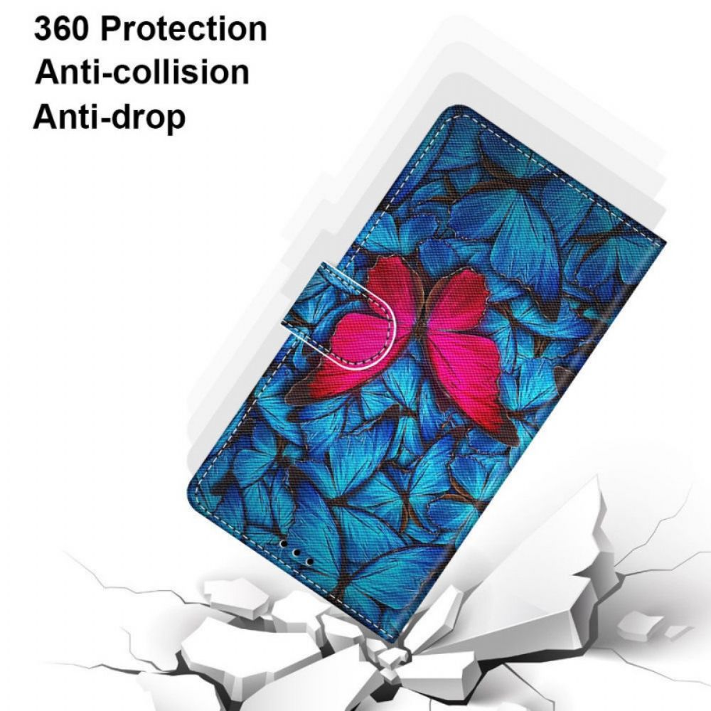 Folio-hoesje voor Samsung Galaxy A03 Core Rode Vlinder Op Blauwe Achtergrond