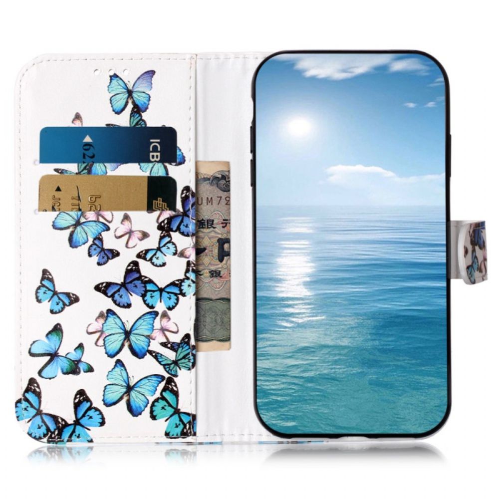 Folio-hoesje Poco C65 Telefoonhoesje Vlucht Blauwe Vlinders