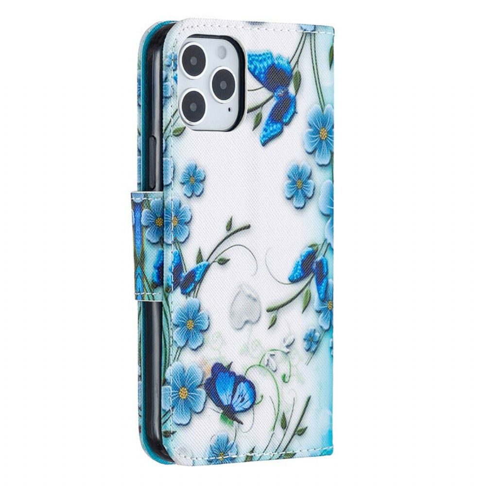 Leren Hoesje voor iPhone 12 / 12 Pro Met Ketting Blauwe Vlinders En Bloemen Met Band