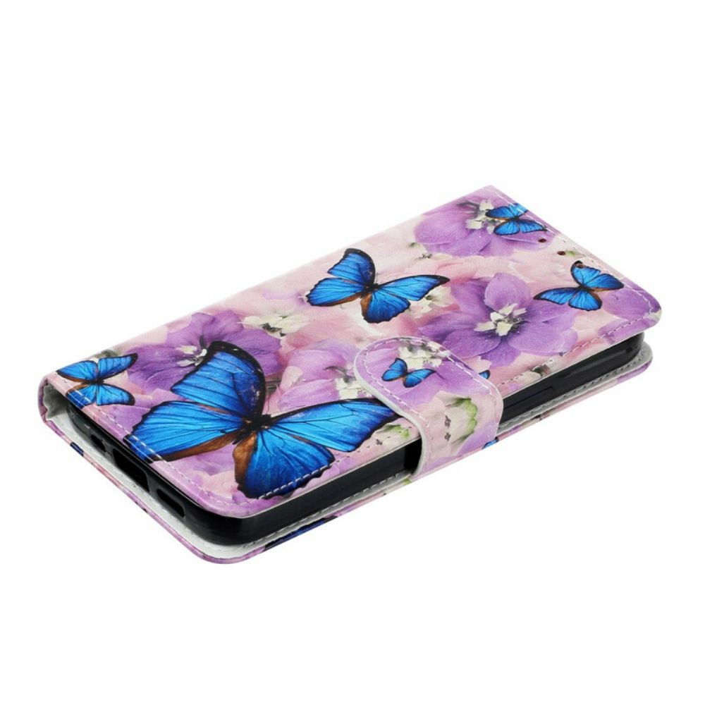 Folio-hoesje voor iPhone 13 Mini Blauwe Vlinders In Bloemen