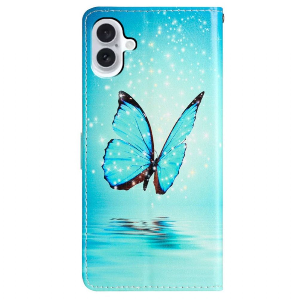 Folio-hoesje iPhone 16 Telefoonhoesje Blauwe Vlinder Met Riem