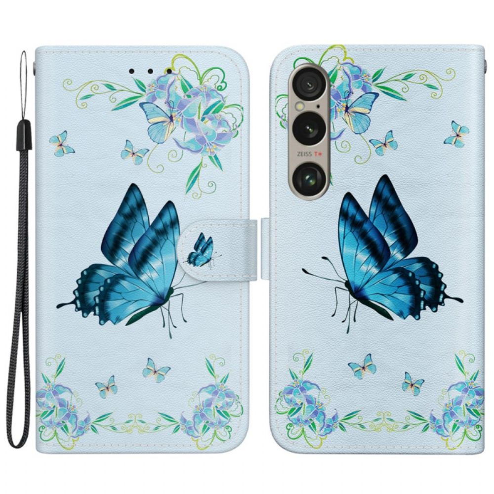 Folio-hoesje Sony Xperia 1 Vi Blauwe Vlinder En Bloemen Met Riempje